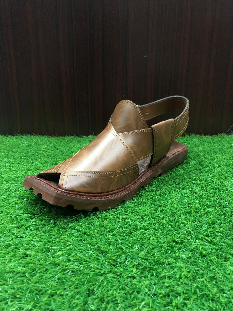 "Traditional Peshawari Chappals with a sleek design, crafted from soft leather and adorned with fine stitching, representing the rich cultural heritage of Peshawar, Pakistan."

