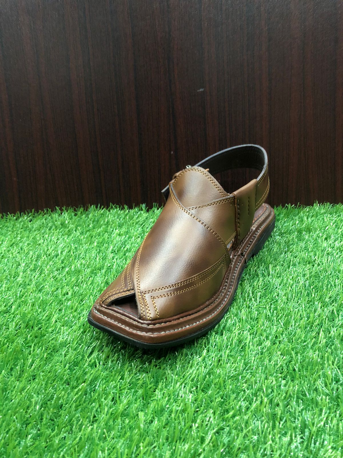 
Time to craft: Each pair of Peshawari chappals can take anywhere from 5 to 12 hours to be handcrafted by skilled artisans.
"A pair of Peshawari Chappals crafted from high-quality pure leather, featuring a triple-gair design with a stylish double-shade color combination. The intricate stitching and durable construction make these chappals both elegant and long-lasting."
